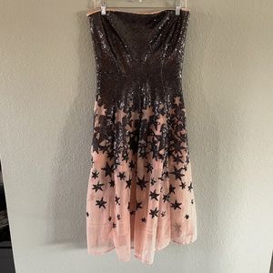 Nude and black strapless sequined cocktail dress